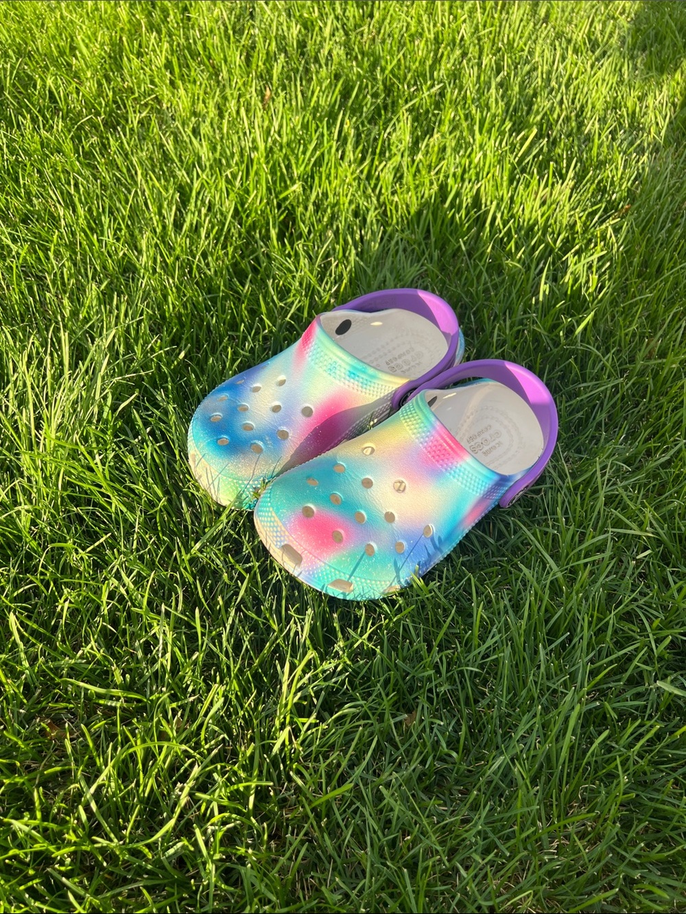 CROCS Kids Tie-Dye Clogs with Purple Heel Strap